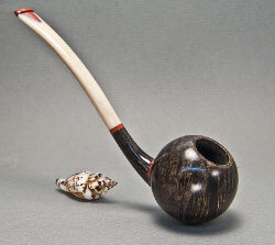 une pipe par Kostas  Gourvelos