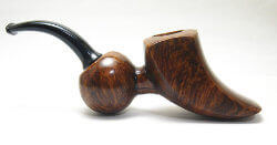 une pipe par Dimitris Mostras