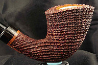 une pipe par Paolo  Becker